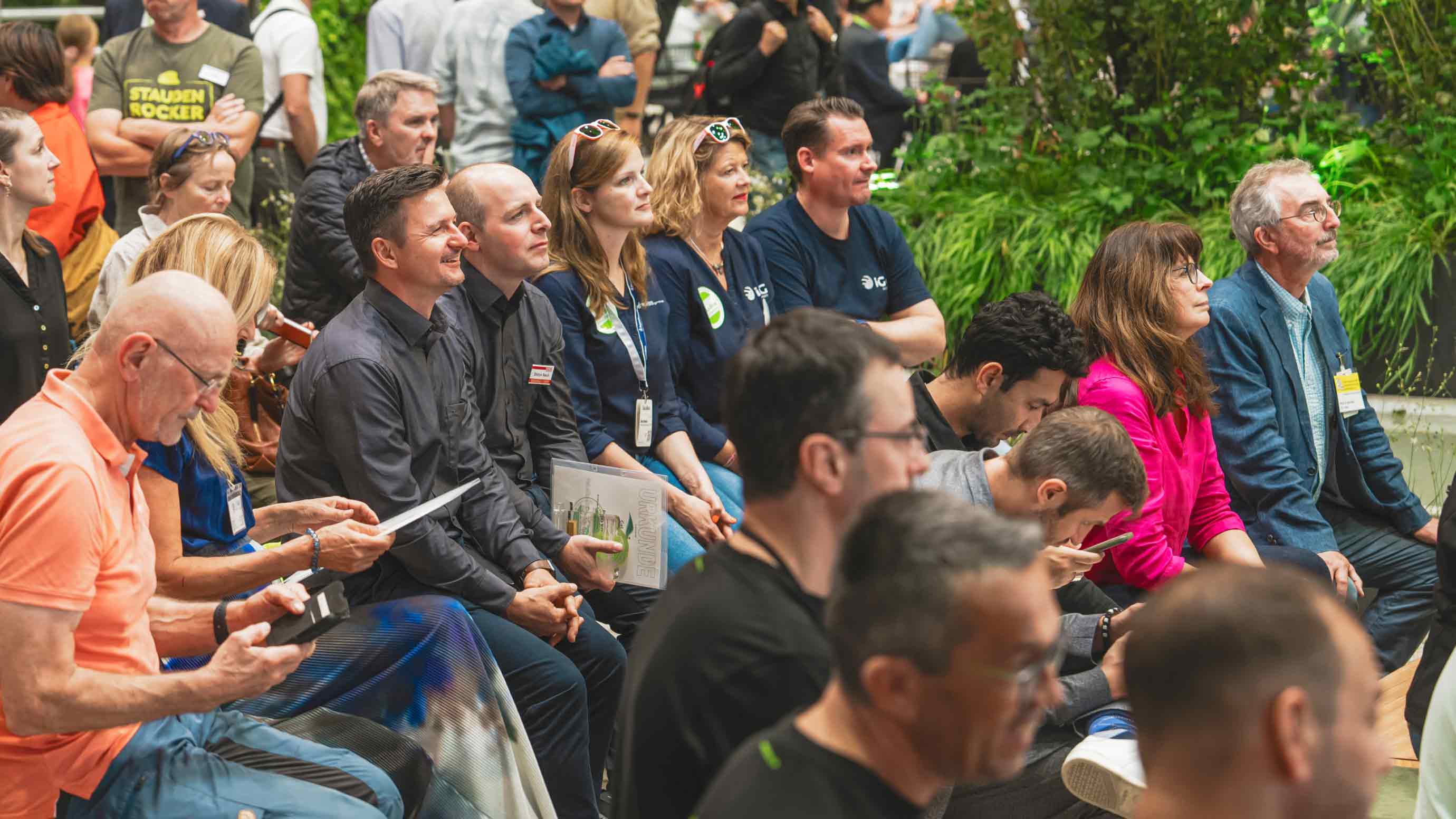 Visitors participating in a forum